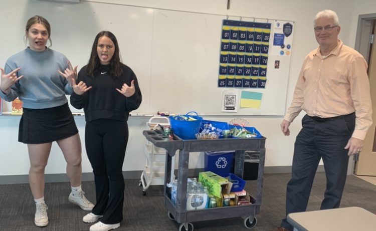 Olivia Blumers and Andie
Teske deliver snacks to Mr. Costello's room 