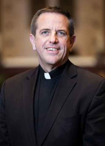 Fr. Chris Collins, former Cotter teacher, and VP at the University of St. Thomas