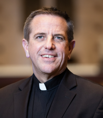 Fr. Chris Collins, former Cotter teacher, and VP at the University of St. Thomas