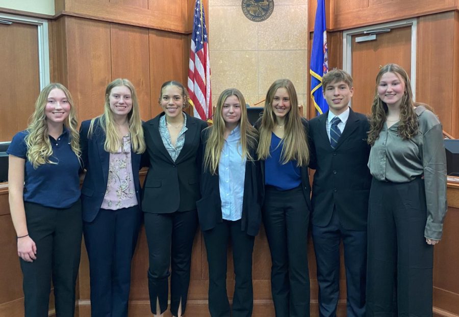 Members of Cotter Mock Trial's "white team", made up of first year team members Emma McRaith, Savannah Loken, Annie Modjeski, Hannah Casselman, Jase Vafaei, and Colleen Costello reporting for trial. 