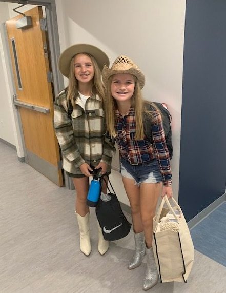 Brooklyn and Brielle Staudacher arriving at school dressed in Western gear for the Homecoming Week dress up day