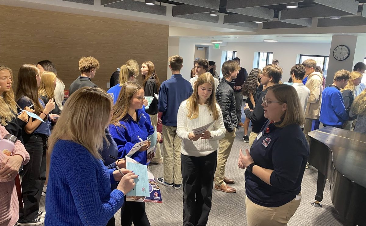 Cotter students talk to a representative from Viterbo University at a recent college and job fair 