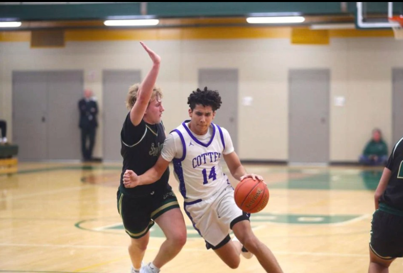 Mateo Lopez-Amor drives to the basket in a game at Rushford-Peterson