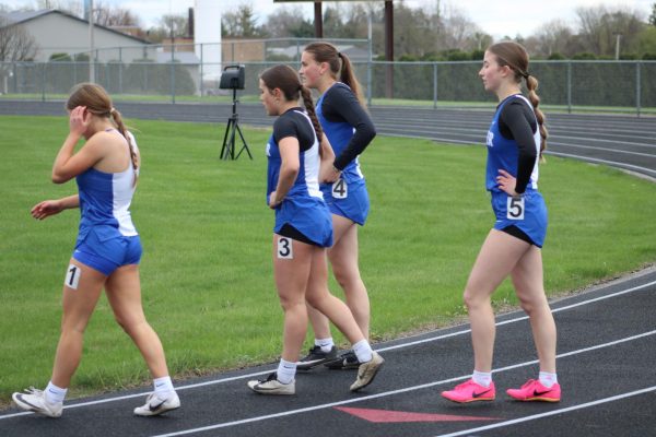 Cotter girls checking results after the race. The girls team is on a roll and hopes to finish the season with another state title