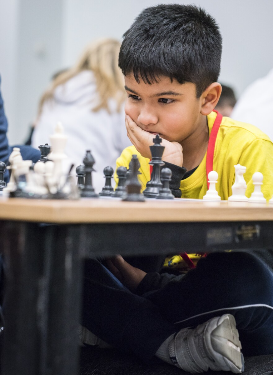 Cotter student Beto Gaitan is locked in as an 8 year old in a chess tournament in Torreon, Mexico