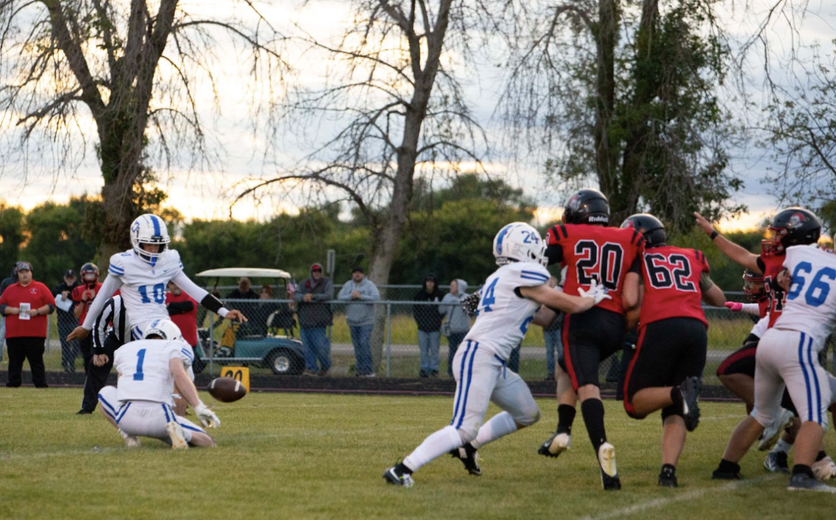 Macs Nisbit connects on an extra point Kenyon-Wanamingo