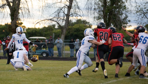 Macs Nisbit connects on an extra point Kenyon-Wanamingo